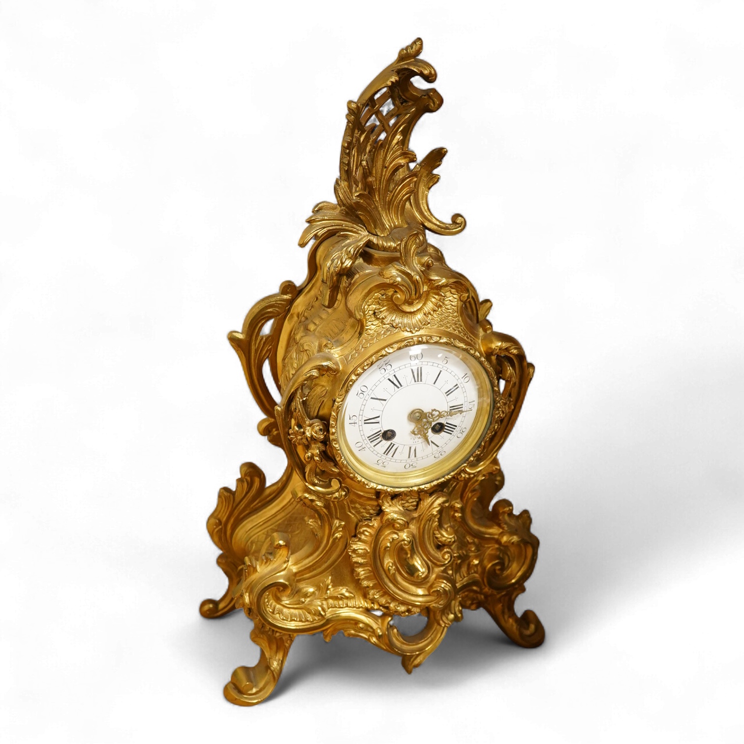 An early 20th century French Louis XV-style ormolu clock garniture - clock 50cm high